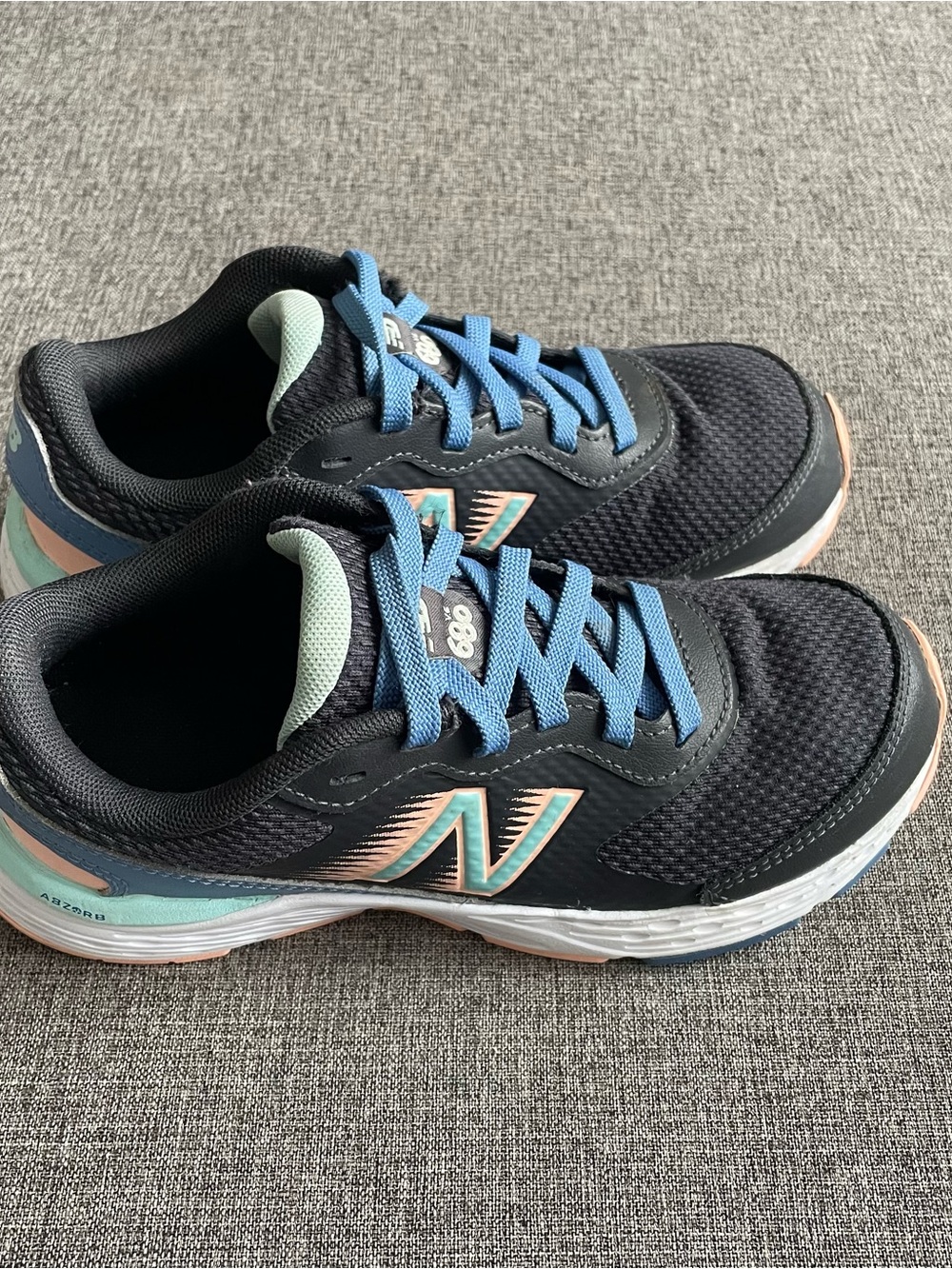New Balance 680v6 Kids Black Sneakers with Blue & Mint Accents